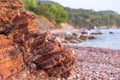 Wild red rocks beach Crvena Glavica, Montenegro Royalty Free Stock Photo