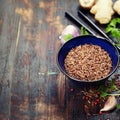 Wild rice in ceramic bowl and ingredients Royalty Free Stock Photo