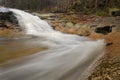 Wild river stream in autumn forrest Royalty Free Stock Photo