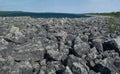 Wild rocky lanscape along Utsjoki river in Lapland Royalty Free Stock Photo