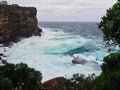 Pacific Ocean Storm Waves Crashing on Sandstone Cliff, Australia Royalty Free Stock Photo