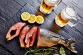 Wild salmon cut in steaks and beer Royalty Free Stock Photo