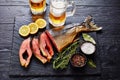 Wild salmon cut in steaks and beer Royalty Free Stock Photo