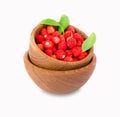 Wild small strawberry in a wooden bowl Royalty Free Stock Photo