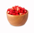 Wild small strawberry in a wooden bowl Royalty Free Stock Photo
