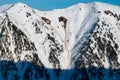 Wild snowy slope with slab avalanche occurred.