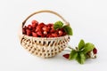 Wild strawberries in a beige basket Royalty Free Stock Photo