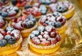 Wild strawberry and raspberry cakes in ancient city of strawberry Nemi, Castelli Romani, Italy