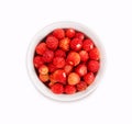 Wild strawberry in a wooden bowl. Royalty Free Stock Photo