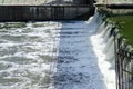 Wild swirling water released from dam Royalty Free Stock Photo