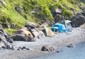 Wild tourist camping on desert beach on the russian reserve