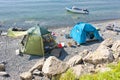 Wild tourist camping on desert beach on the russian reserve isle