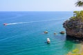 Wild Turkish beach in the Bay of the mountain coast of the Mediterranean Sea. August 7, 2022 Beldibi , Turkey Royalty Free Stock Photo