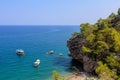 Wild Turkish beach in the Bay of the mountain coast of the Mediterranean Sea. August 7, 2022 Beldibi , Turkey Royalty Free Stock Photo