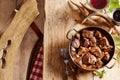 Wild venison hotpot of goulash with deer antlers Royalty Free Stock Photo