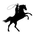 Wild west cowboy with lasso and horse black and white vector silhouette Royalty Free Stock Photo