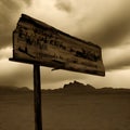 Wild west desert cloudy sky creepy scene scary wooden sign post