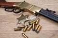 Wild west gun with ammunition and marshal badge Royalty Free Stock Photo