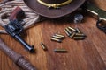 Wild west guns, ammunition and silver dollars