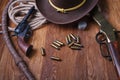 Wild west guns, ammunition and silver dollars Royalty Free Stock Photo