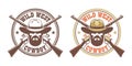 Wild west retro logo - cowboy in hat with crossed guns winchesters