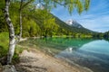 Wilder Kaiser mountain range reflected in idyllic Hintersteiner See, Scheffau, Tyrol, Austria, Europe