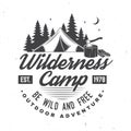Wilderness camp. Be wild and free. Vector illustration. Concept for badge, shirt or logo, print, stamp. Vintage Royalty Free Stock Photo