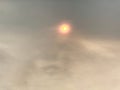 Wildfire smoke blocking sun in the middle of the day Royalty Free Stock Photo
