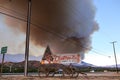 Xmas trees sign in background of the Thomas Fire in Ventura