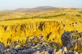 Wildflowers and the cliffs of Mount Nitai, in mount Arbel Royalty Free Stock Photo