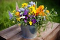 wildflowers in a galvanized steel bucket Royalty Free Stock Photo