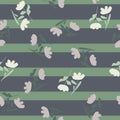 Wildflowers nature seamless pattern with flower ditsy random ornament. Green and purple striped background Royalty Free Stock Photo