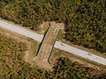 Wildlife crossing-a bridge over a highway in the forest. The view from the top