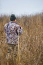 wildlife photographer in camouflage
