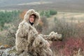 Wildlife photographer in the ghillie suit working Royalty Free Stock Photo