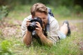 Wildlife photographer outdoor in action Royalty Free Stock Photo