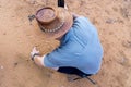 Wildlife ranger explaining animal tracks