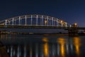 The Wilhelmina bridge at the river IJssel near Deventer in the Netherlands at night