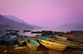 Wilight landscape with boats on Phewa lake Royalty Free Stock Photo