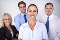 They will always back me up. A group of four businesspeople smiling confidently at the camera. Royalty Free Stock Photo