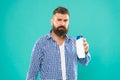 Will it help me. good morning. perfect skin lotion. brutal hipster hold shampoo bottle. Bearded man with healthy hair Royalty Free Stock Photo