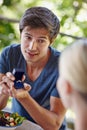 Will you let me love you forever. a handsome young man proposing to his girlfriend with an engagement ring. Royalty Free Stock Photo