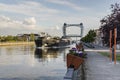 Willebroek, Belgium - May 27, 2019: Large river barge sailing under the famous iron drawbridge of Willebroek