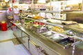 Willemstad, Curacao, Netherlands - December 5, 2019: Kitchen crew work in the galley of a cruise ship in the Caribbean Sea Royalty Free Stock Photo