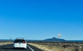 Desert scenery along the highway from Williams, Arizona to the Grand Canyon with bushes and brush in the foreground Royalty Free Stock Photo