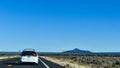 Desert scenery along the highway from Williams, Arizona to the Grand Canyon with bushes and brush in the foreground Royalty Free Stock Photo