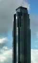 Williams Tower in Houston, Texas against the Blue Sky which is eerily reflected on the glass facade