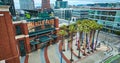 Willie Mays Gate aerial of Oracle Park front entrance with statue and palm trees