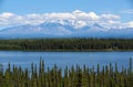 Spectacular view from the Edgerton Highway over Willow Lake to Mount Sanford and other volcanoes of the Wrangell Mountains.