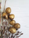 Willow, quail eggs Easter on white wooden Royalty Free Stock Photo